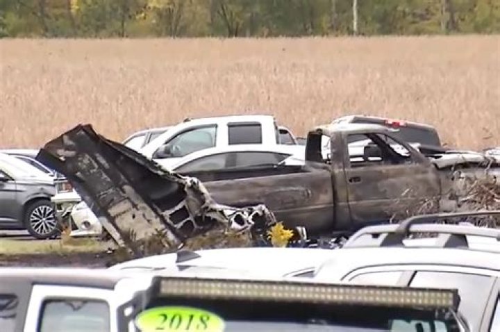 
2 People Dead After Small Plane Crashes into Car Dealership Parking Lot in Ohio 