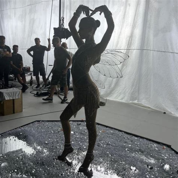 
Bella Hadid Wears Crystal-Covered Nude Catsuit in Behind-the-Scenes Swarovski Pics — See Her Look! 