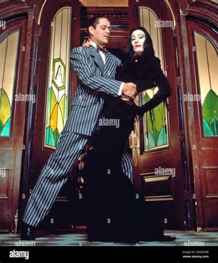 How old is Anjelica Huston in Addams family?