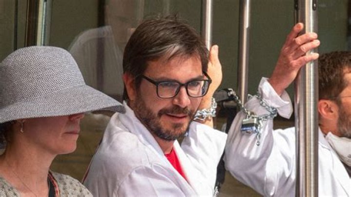
Who Is Peter Kalmus? NASA Scientist Arrested After Chaining Himself To Chase Bank 